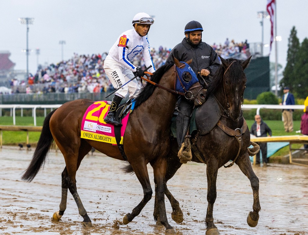 Owen Almighty on the track at the Kentucky Derby with pony rider